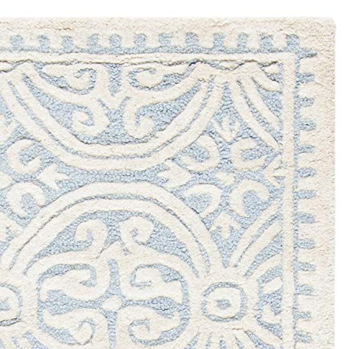 Safavieh Cambridge Collection CAM123A Handmade Moroccan Wool Area Rug, 10' x 14', Light Blue/Ivory