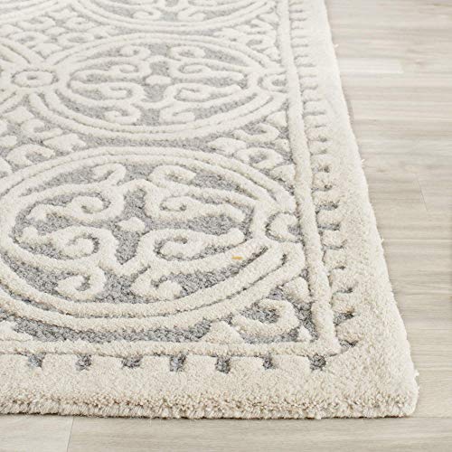 Safavieh Cambridge Collection CAM123K Handmade Moroccan Wool Area Rug, 5' x 8', Purple/Ivory