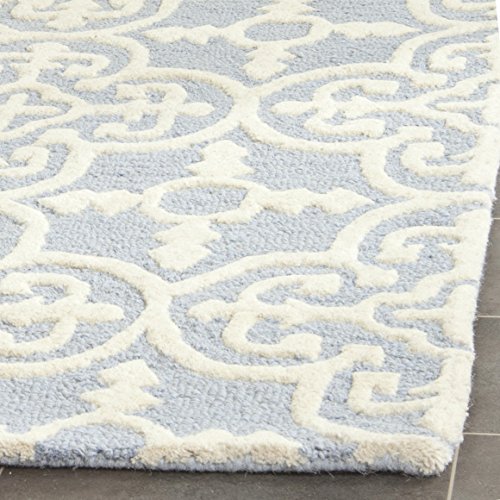 Safavieh Cambridge Collection CAM133A Handmade Moroccan Wool Area Rug, 10' x 14', Light Blue/Ivory