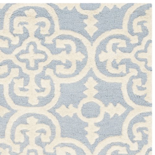 Safavieh Cambridge Collection CAM133A Handmade Moroccan Wool Area Rug, 10' x 14', Light Blue/Ivory