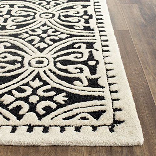 Safavieh Cambridge Collection CAM123E Handmade Moroccan Wool Area Rug, 6' x 9', Black/Ivory