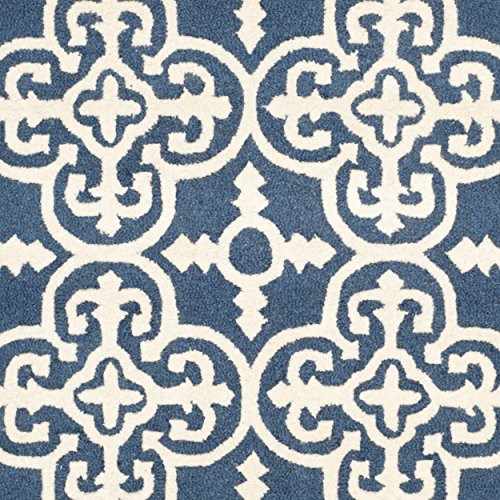 Safavieh Cambridge Collection CAM133G Handmade Moroccan Wool Area Rug, 9' x 12', Navy/Ivory