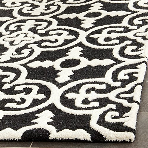 Safavieh Cambridge Collection CAM133E Handmade Moroccan Wool Area Rug, 9' x 12', Black/Ivory