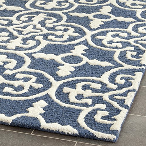 Safavieh Cambridge Collection CAM133G Handmade Moroccan Wool Area Rug, 6' x 9', Navy/Ivory