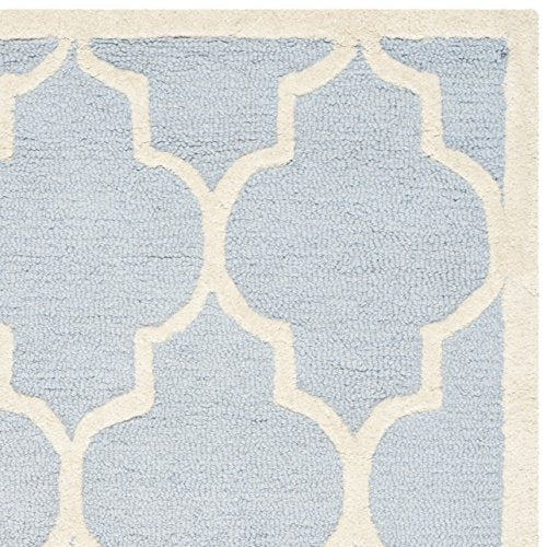 Safavieh Cambridge Collection CAM134A Handmade Moroccan Wool Area Rug, 6' x 9', Light Blue/Ivory