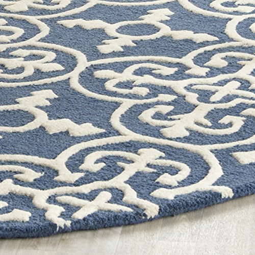 Safavieh Cambridge Collection CAM133G Handmade Moroccan Wool Area Rug, 8' Round, Navy/Ivory