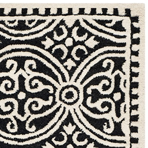 Safavieh Cambridge Collection CAM123E Handmade Moroccan Wool Area Rug, 6' x 9', Black/Ivory